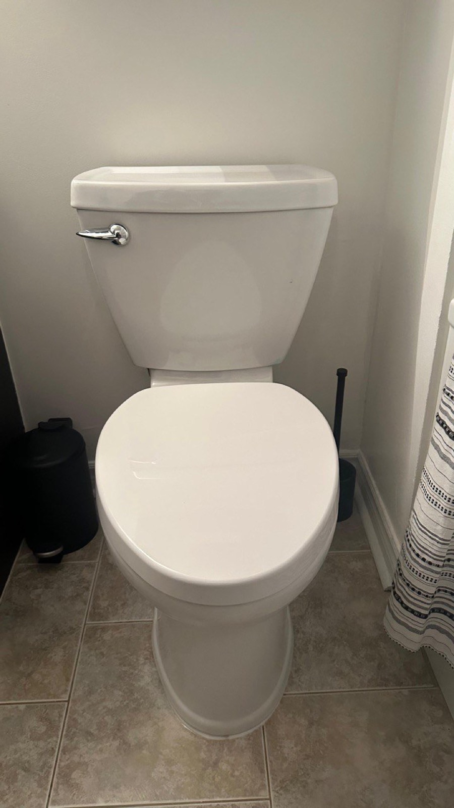Newly installed residential toilet in a finished bathroom in the Niagara Region