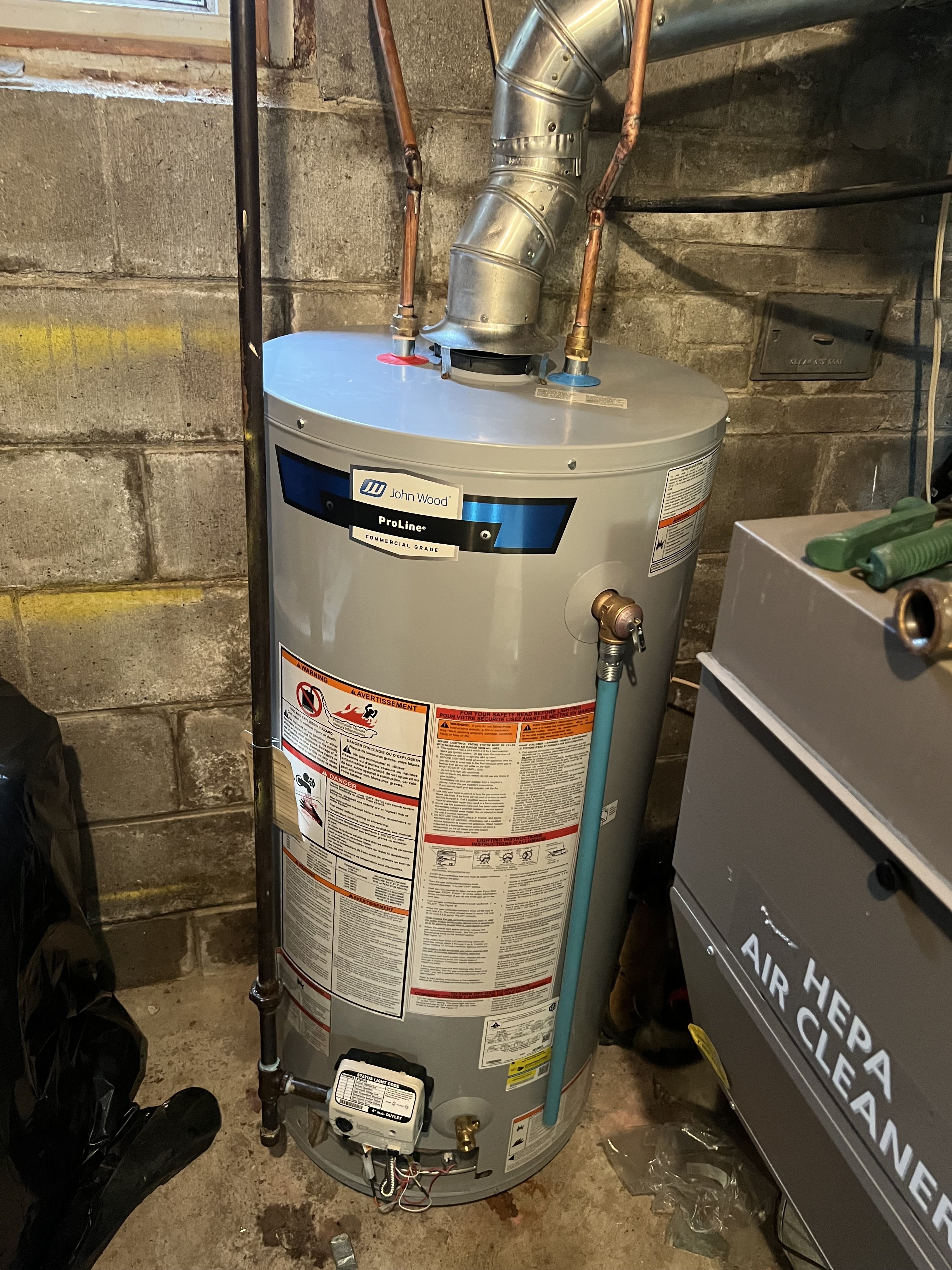 Tank water heater installed in a Niagara Region basement